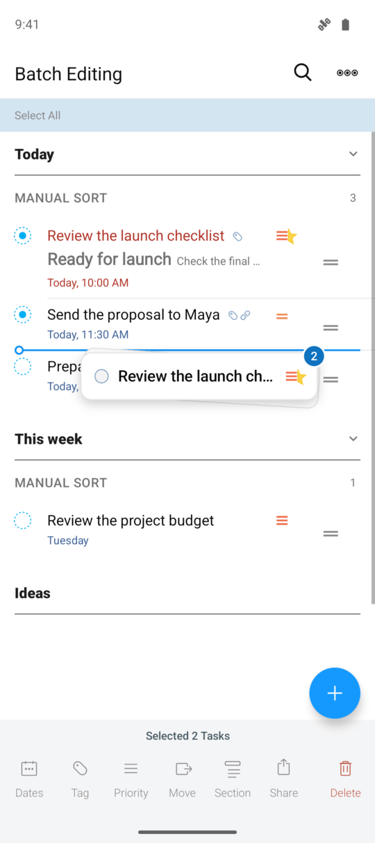 A real two-task drag in Android with a blue insertion line between task rows