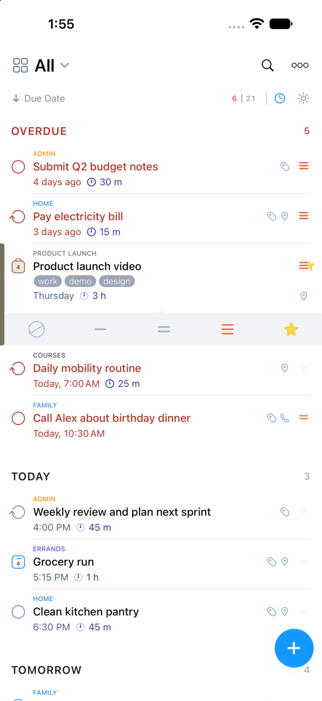 A task row expanded to show the priority and star strip